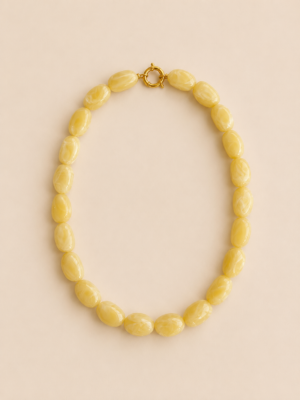 collier perles résine jaune