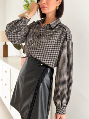 jupe courte noir en simili cuir à franges
